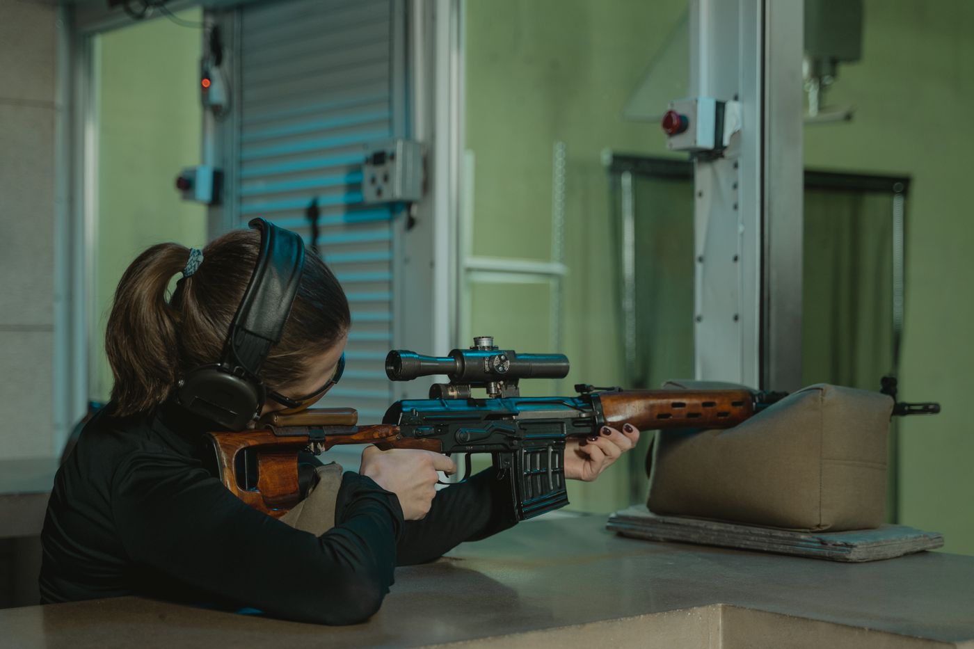 Firearms instructor at a range